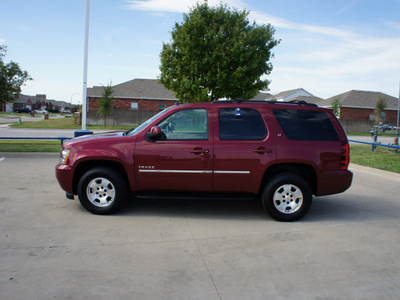 chevrolet tahoe 2011 dk  red suv lt flex fuel 8 cylinders 4 wheel drive automatic 76108