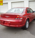 chrysler sebring 2004 red sedan lx gasoline 4 cylinders front wheel drive automatic 43560