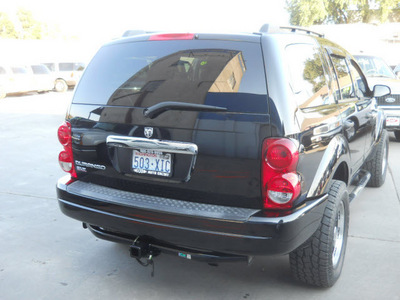 dodge durango 2004 black suv slt gasoline 8 cylinders 4 wheel drive automatic with overdrive 99212