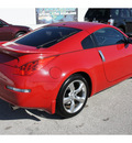 nissan 350z 2006 red coupe gasoline 6 cylinders rear wheel drive 6 speed manual 77388