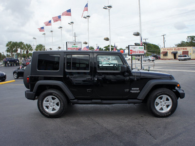 jeep wrangler unlimited 2010 black suv sport gasoline 6 cylinders 4 wheel drive automatic 33021