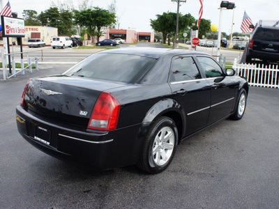 chrysler 300 2006 black sedan touring gasoline 6 cylinders rear wheel drive automatic 33021
