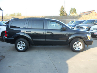 dodge durango 2006 black suv slt gasoline 8 cylinders 4 wheel drive automatic with overdrive 99212