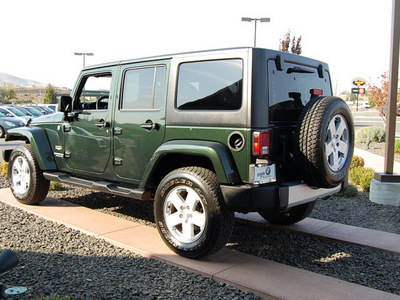 jeep wrangler unlimited 2011 green suv sahara gasoline 6 cylinders 4 wheel drive automatic 99352