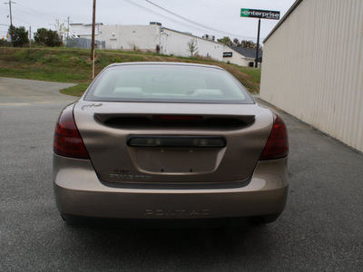 pontiac grand prix 2007 brown sedan gasoline 6 cylinders front wheel drive automatic 27215