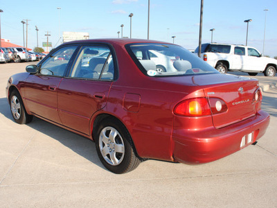 toyota corolla 2002 red sedan le gasoline 4 cylinders front wheel drive automatic 75228