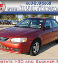 toyota corolla 2002 red sedan le gasoline 4 cylinders front wheel drive automatic 75228