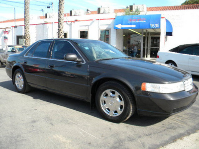 cadillac seville 2002 brown sedan sls gasoline 8 cylinders front wheel drive automatic 92882