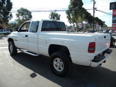 dodge ram pickup 1500 1997 white laramie slt gasoline v8 4 wheel drive automatic 92882