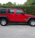 jeep wrangler unlimited 2011 red suv sport gasoline 6 cylinders 4 wheel drive automatic 33157