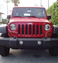 jeep wrangler unlimited 2011 red suv sport gasoline 6 cylinders 4 wheel drive automatic 33157