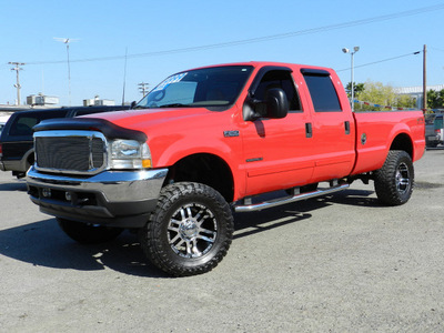 ford f 250 super duty 2002 red lariat diesel 8 cylinders 4 wheel drive automatic 95678