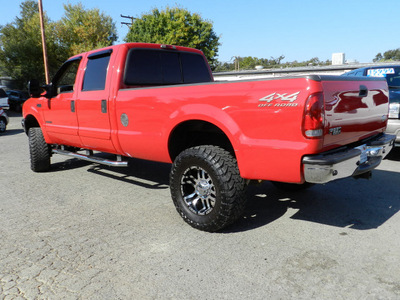 ford f 250 super duty 2002 red lariat diesel 8 cylinders 4 wheel drive automatic 95678