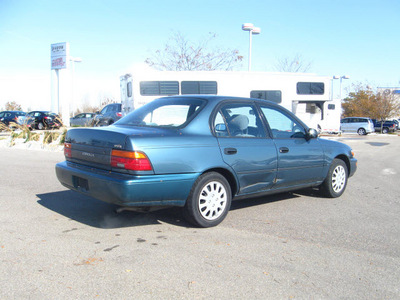 toyota corolla 1995 blue sedan dx gasoline 4 cylinders front wheel drive 5 speed manual 80504