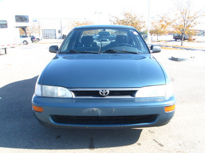 toyota corolla 1995 blue sedan dx gasoline 4 cylinders front wheel drive 5 speed manual 80504