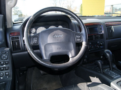 jeep grand cherokee 2004 blue suv limited gasoline 8 cylinders 4 wheel drive automatic 61008