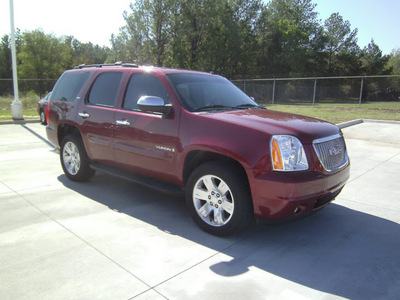gmc yukon 2009 dk  red suv slt gasoline 8 cylinders 2 wheel drive automatic with overdrive 75503