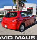 nissan versa 2007 red hatchback sl gasoline 4 cylinders front wheel drive automatic 32771