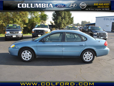 ford taurus 2007 blue sedan se gasoline 6 cylinders front wheel drive automatic 98632