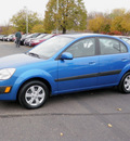 kia rio 2009 blue sedan lx gasoline 4 cylinders front wheel drive automatic with overdrive 55124
