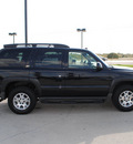 chevrolet tahoe 2004 black suv z71 flex fuel 8 cylinders 4 wheel drive automatic 76087