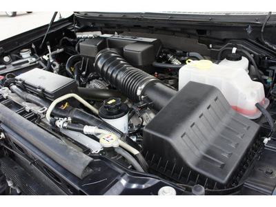 ford f 150 2011 black svt raptor gasoline 8 cylinders 4 wheel drive shiftable automatic 77388