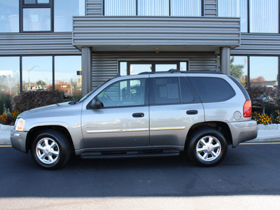 gmc envoy 2006 beige suv sle gasoline 6 cylinders 4 wheel drive automatic with overdrive 07735