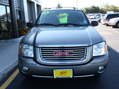 gmc envoy 2006 beige suv sle gasoline 6 cylinders 4 wheel drive automatic with overdrive 07735