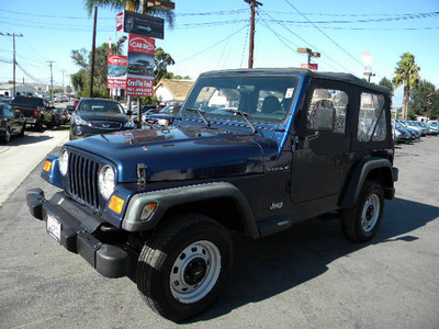jeep wrangler 2002 blue suv se gasoline 4 cylinders 4 wheel drive 5 speed manual 92882