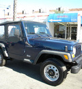 jeep wrangler 2002 blue suv se gasoline 4 cylinders 4 wheel drive 5 speed manual 92882