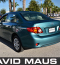 toyota corolla 2010 green sedan le gasoline 4 cylinders front wheel drive automatic 32771