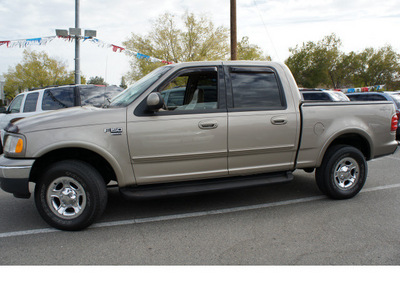 ford f 150 2001 beige lariat gasoline 8 cylinders 4 wheel drive automatic 95678