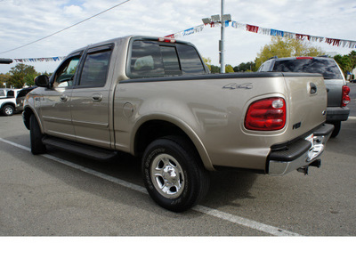 ford f 150 2001 beige lariat gasoline 8 cylinders 4 wheel drive automatic 95678