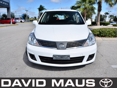 nissan versa 2009 white hatchback gasoline 4 cylinders front wheel drive automatic 32771