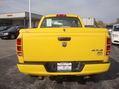 dodge ram 1500 2005 yellow pickup truck slt rumble bee gasoline 8 cylinders 4 wheel drive automatic 60443