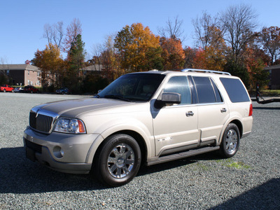 lincoln navigator 2004 beige suv luxury gasoline 8 cylinders 4 wheel drive automatic 27215