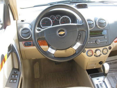 chevrolet aveo 2011 white sedan lt gasoline 4 cylinders front wheel drive automatic 62863