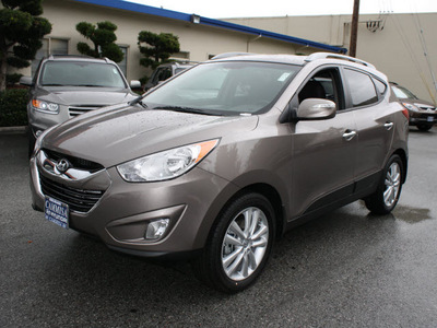 hyundai tucson 2012 brown limited gasoline 4 cylinders all whee drive automatic 94010