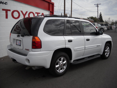 gmc envoy 2004 white suv gasoline 6 cylinders 4 wheel drive automatic 79925