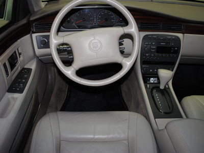 cadillac seville 1997 white sedan luxury sedan gasoline v8 front wheel drive automatic 76108