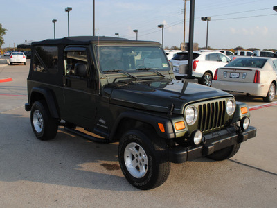 jeep wrangler 2006 green suv unlimited gasoline 6 cylinders 4 wheel drive automatic with overdrive 76087