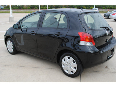 toyota yaris 2009 black hatchback gasoline 4 cylinders front wheel drive automatic 77065