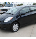 toyota yaris 2009 black hatchback gasoline 4 cylinders front wheel drive automatic 77065