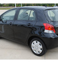 toyota yaris 2009 black hatchback gasoline 4 cylinders front wheel drive automatic 77065