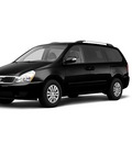 kia sedona 2012 black van gasoline 6 cylinders front wheel drive not specified 44060