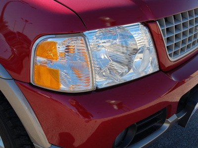 ford explorer 2004 red fire suv eddie bauer flex fuel 6 cylinders 4 wheel drive automatic with overdrive 67210