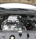 kia sedona 2009 gold van lx gasoline 6 cylinders front wheel drive automatic 43228