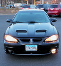 pontiac grand am 2002 black coupe gt gasoline 6 cylinders front wheel drive automatic 55124