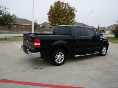 ford f 150 2007 black xlt gasoline 8 cylinders rear wheel drive automatic with overdrive 76108