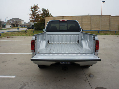 ford f 150 2002 silver pickup truck xl gasoline 6 cylinders rear wheel drive 5 speed manual 76108